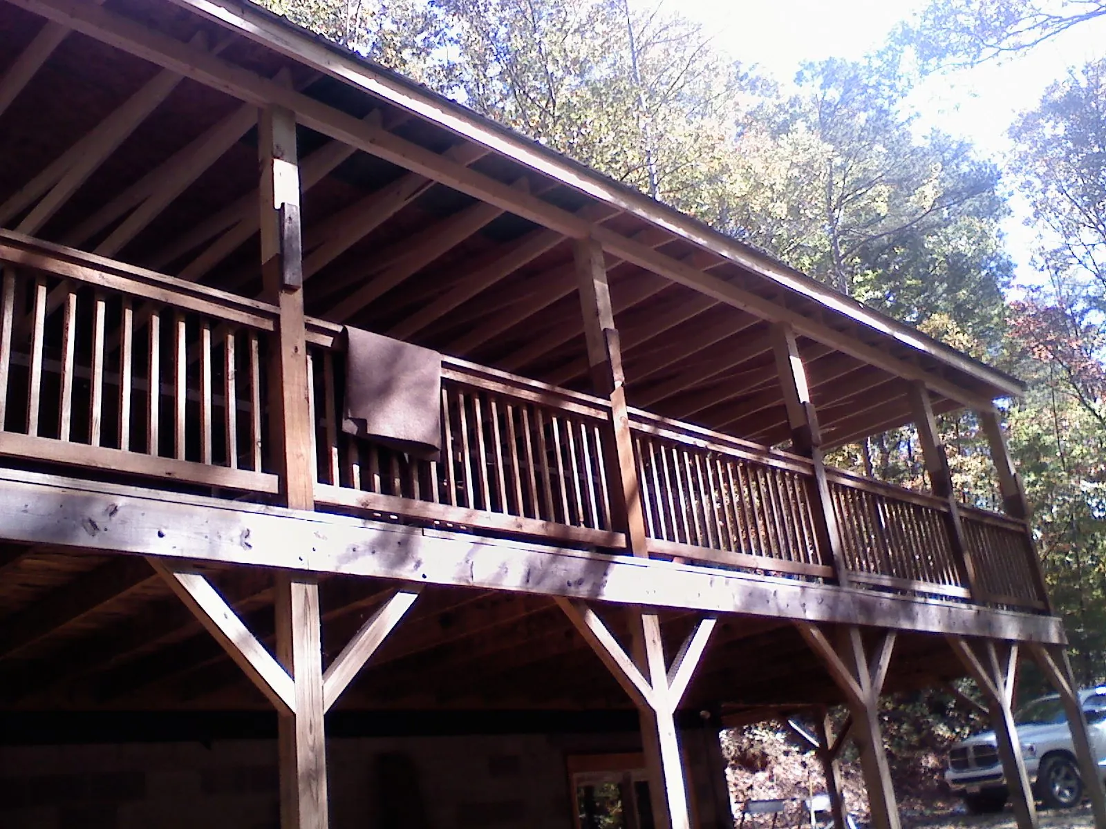 Timber framing under a new elevated porch and deck — Roof Leak Repair in Peralta by Roofing Brothers